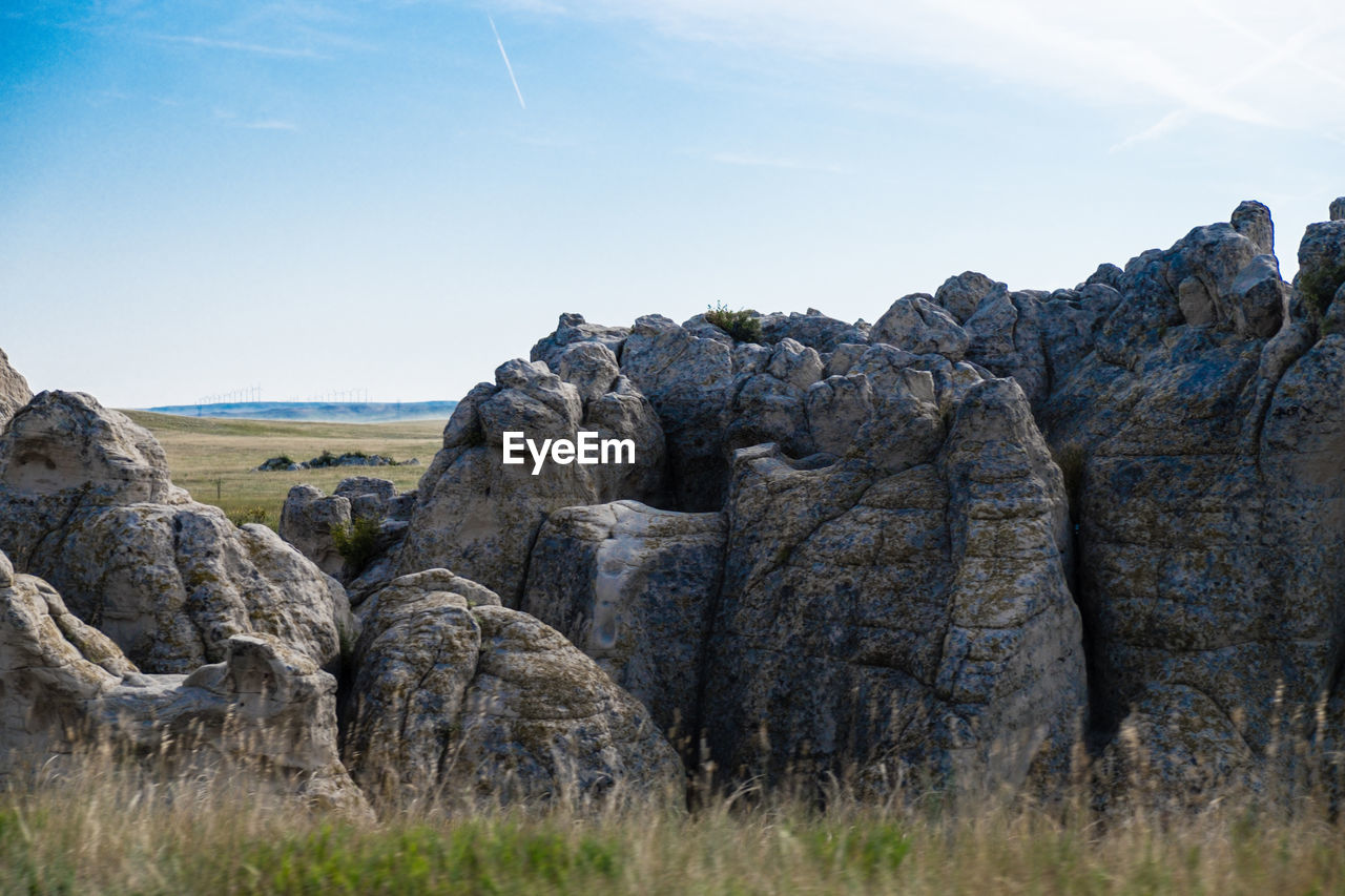 VIEW OF ROCKS AGAINST SKY