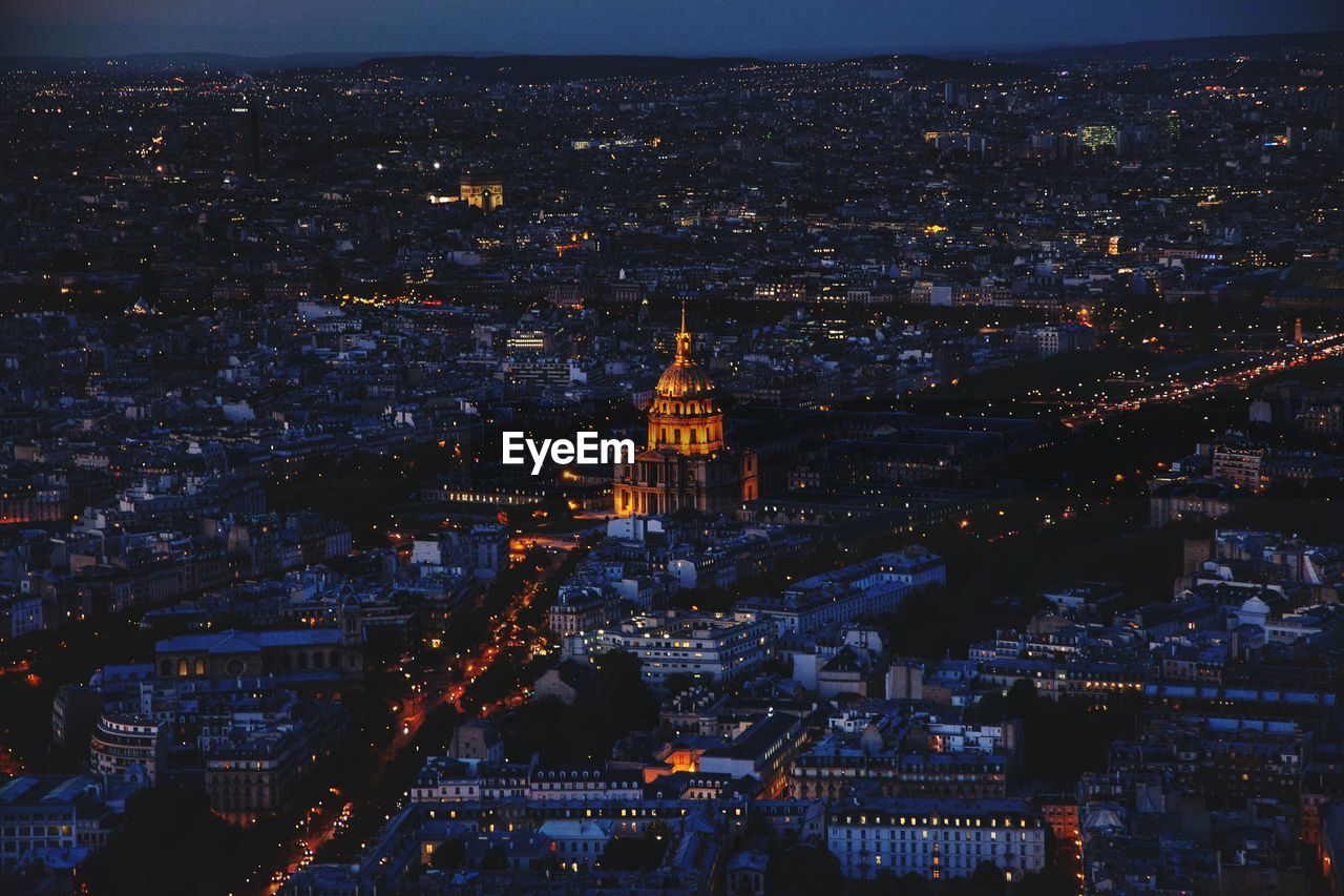 Aerial view of illuminated cityscape at night