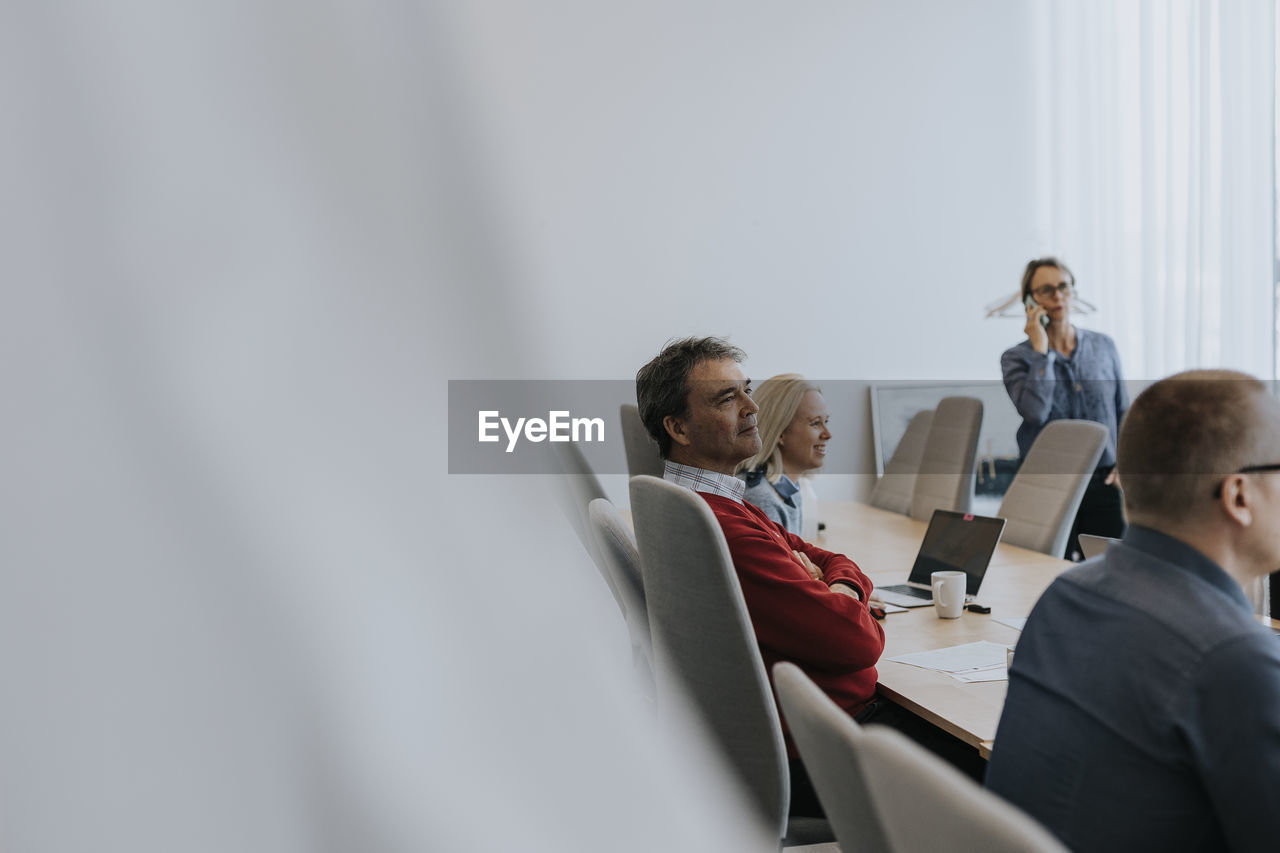 Business people sitting in meeting room