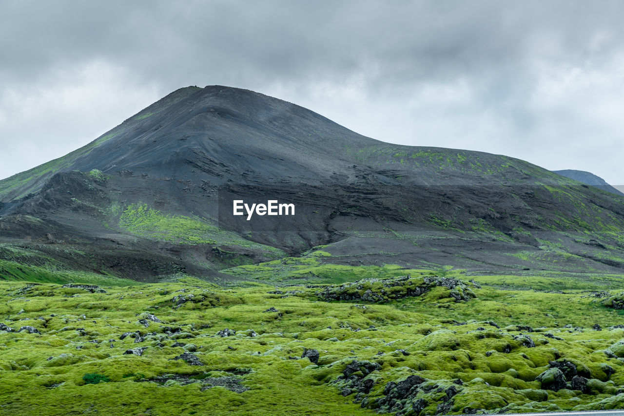 SCENIC VIEW OF VOLCANIC LANDSCAPE AGAINST SKY