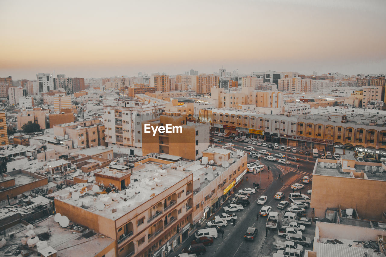 High angle view of buildings in city against sky