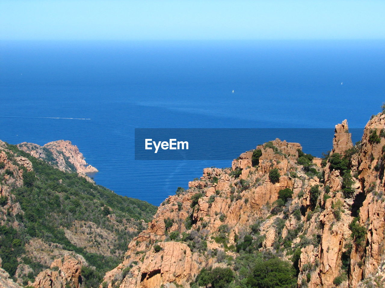 View of cliff by sea