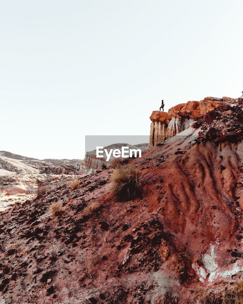 View of person standing on cliff