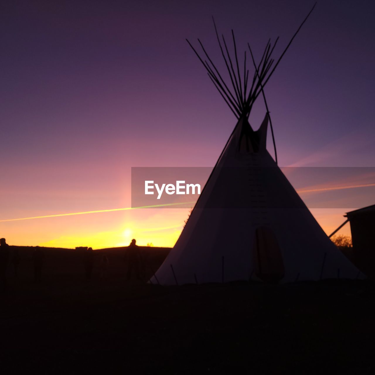 sunset, sky, architecture, dawn, built structure, silhouette, nature, evening, sunlight, horizon, building exterior, no people, afterglow, landscape, environment, beauty in nature, travel destinations, building, outdoors, orange color, religion, cloud, scenics - nature, sun