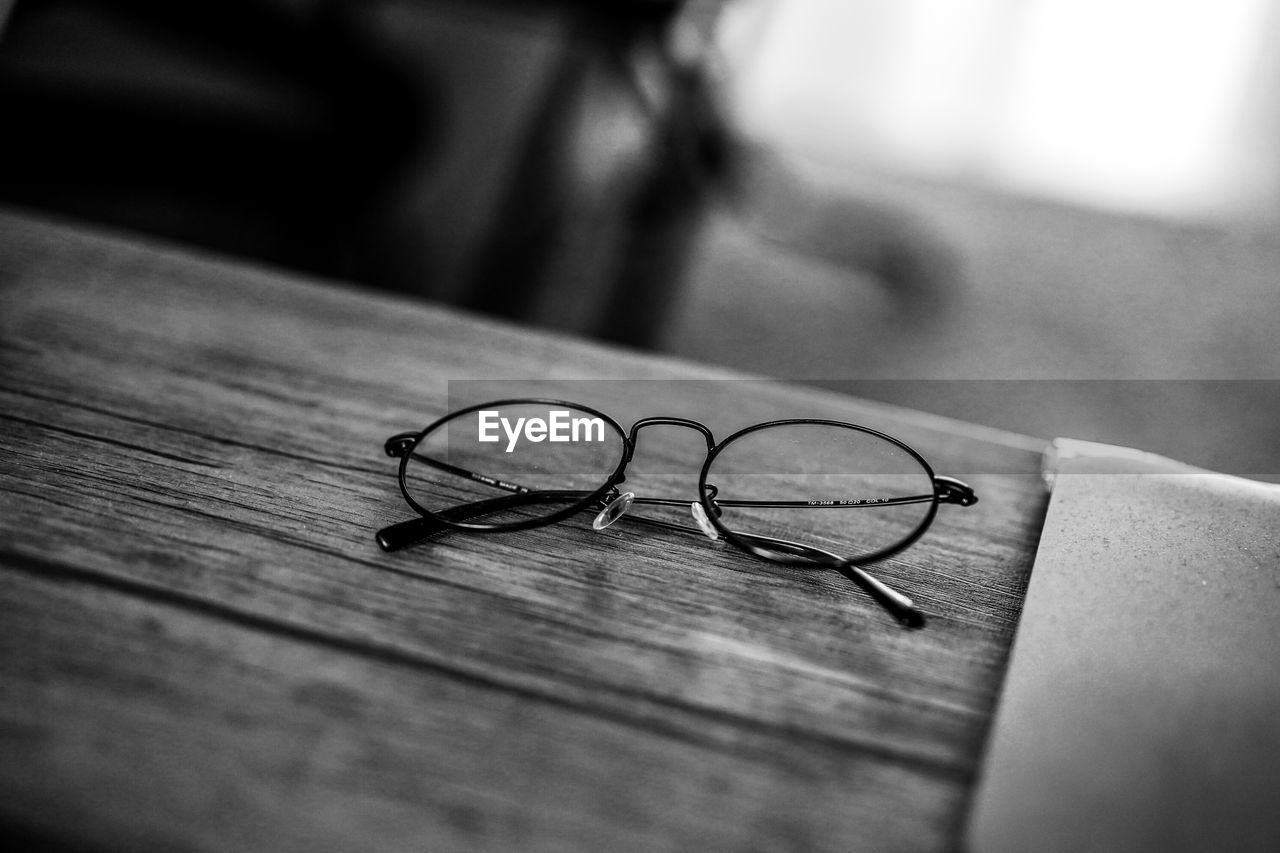 Close-up of eyeglasses on table