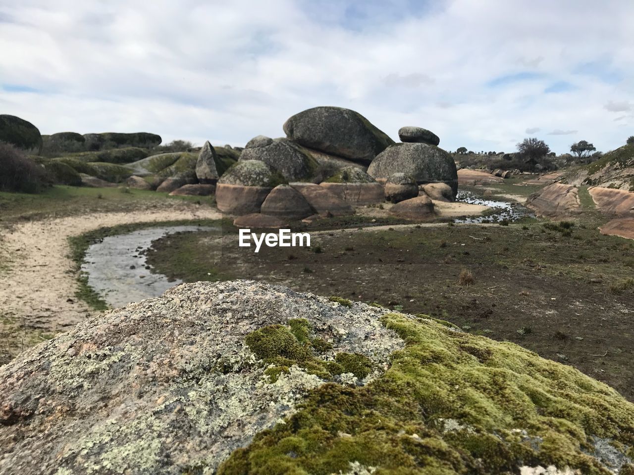 VIEW OF ROCKS ON LANDSCAPE