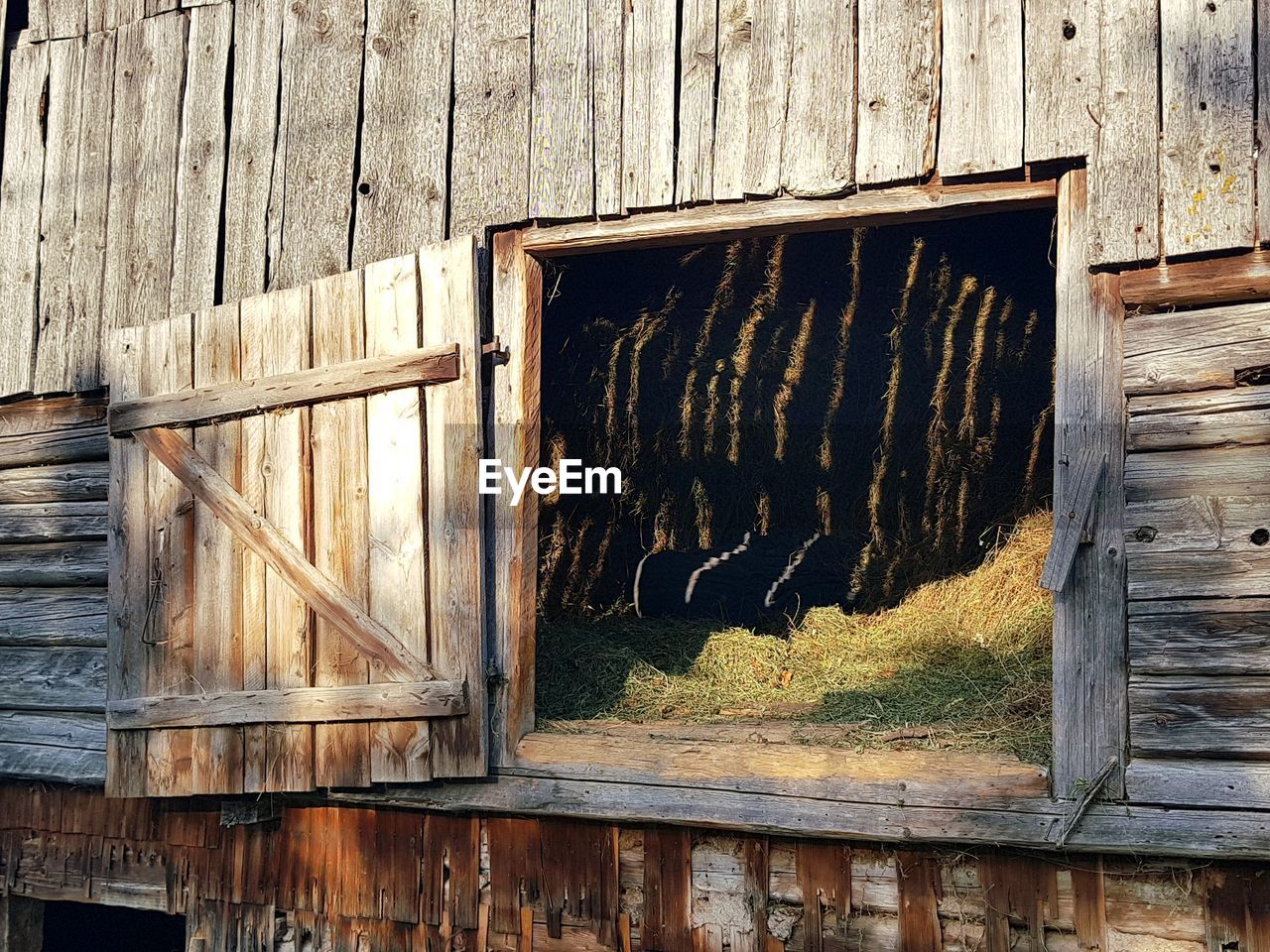 DAMAGED WINDOW OF OLD BUILDING