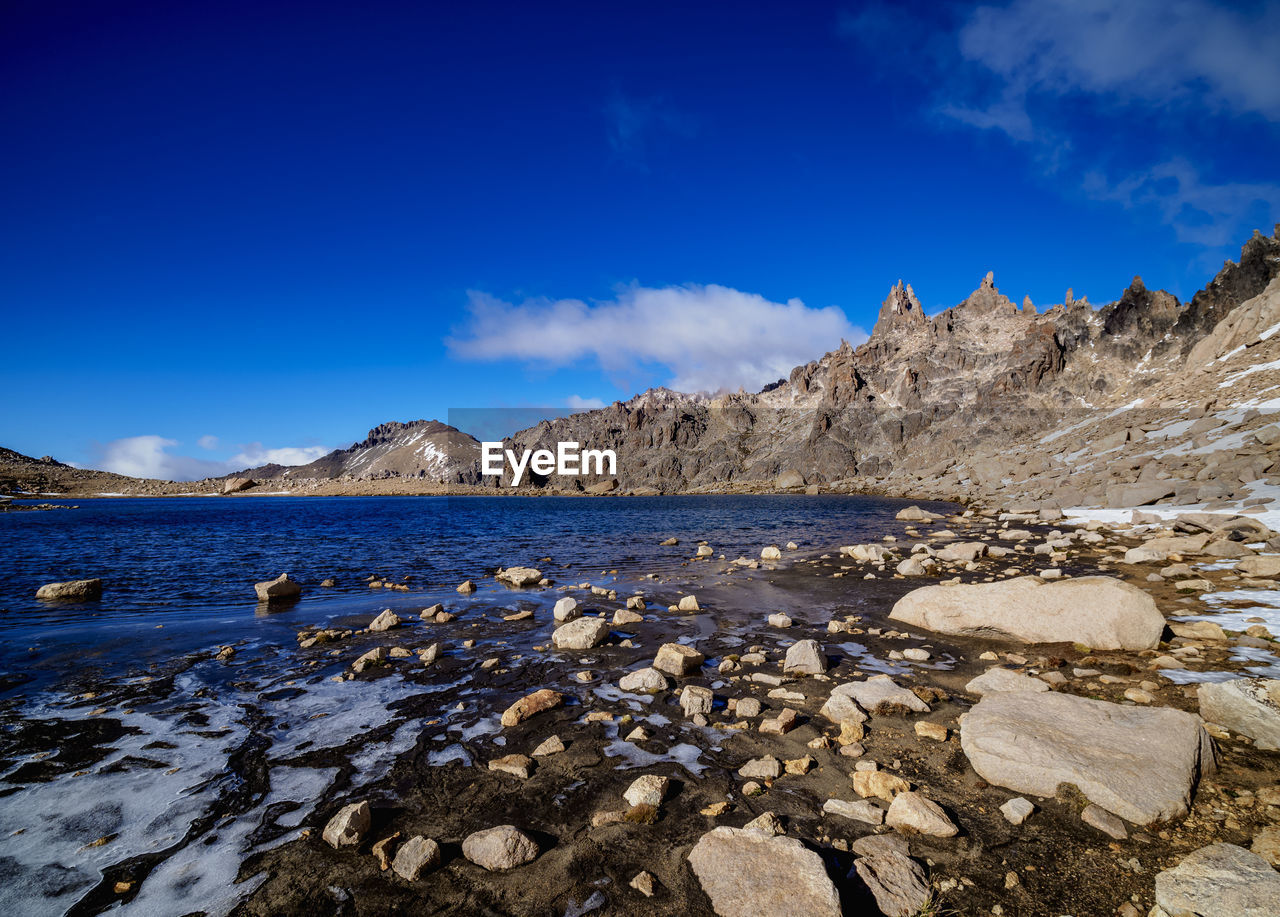 SCENIC VIEW OF SNOWCAPPED MOUNTAIN AGAINST SKY