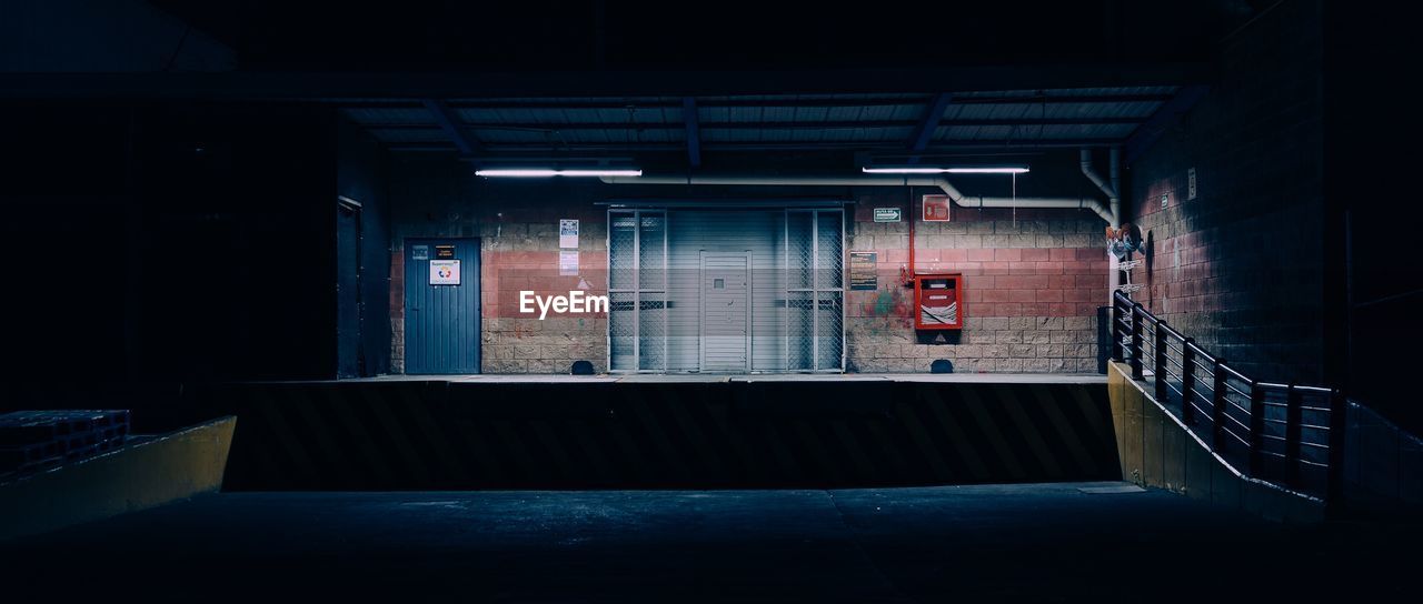 INTERIOR OF ILLUMINATED SUBWAY