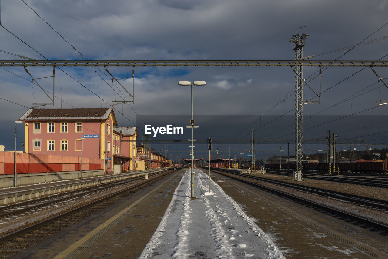 railroad tracks against sky