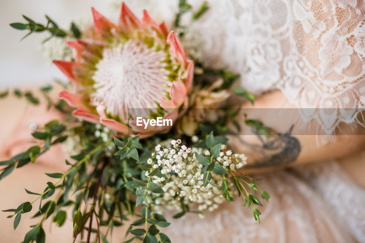 Close-up of flower bouquet with protea