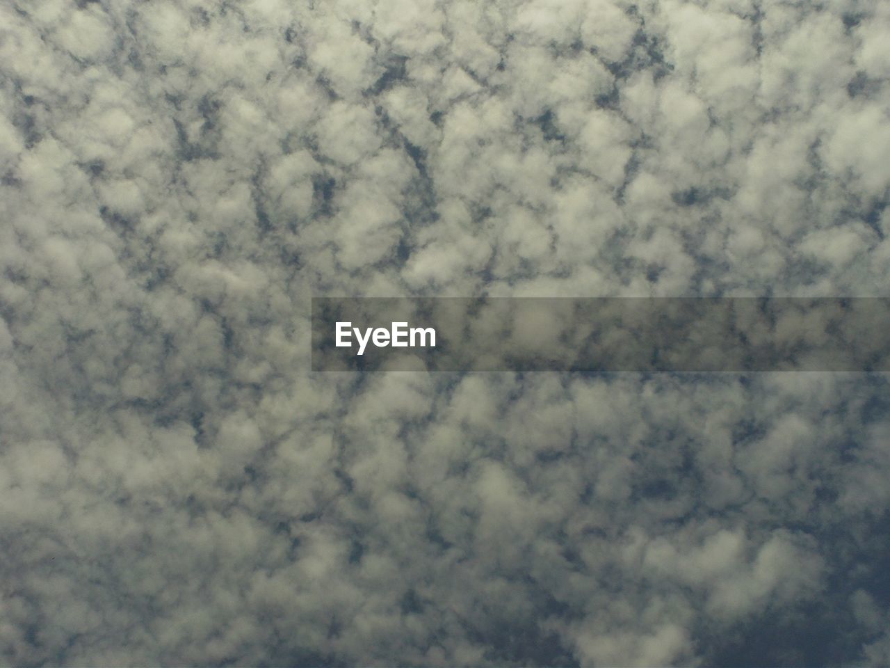 LOW ANGLE VIEW OF CLOUDY SKY AT NIGHT