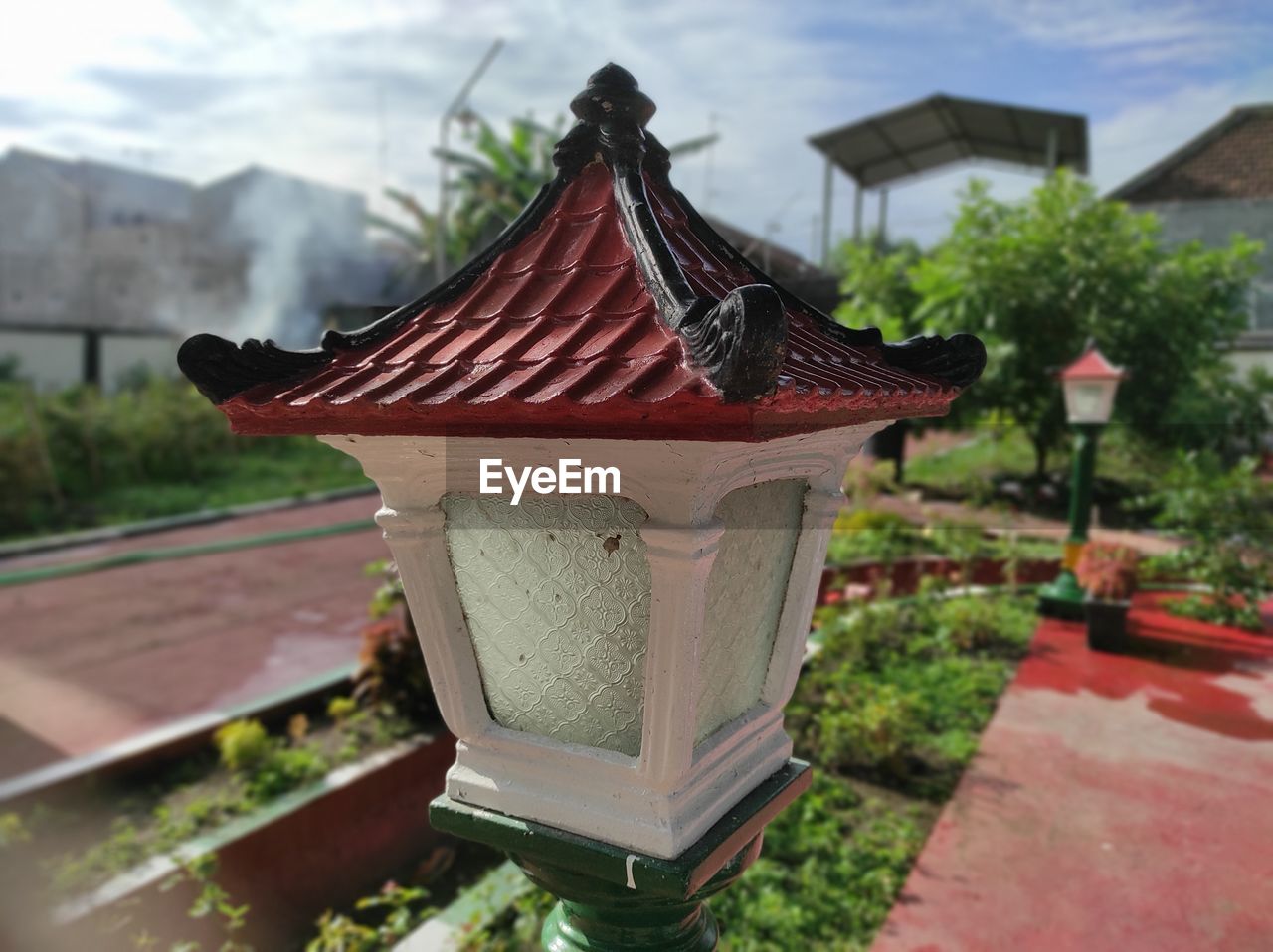 CLOSE-UP OF TEMPLE AGAINST BUILDINGS