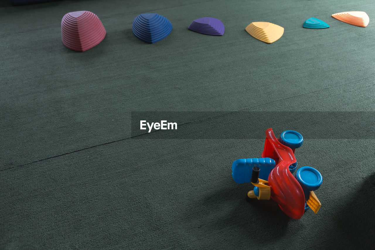 High angle view of toys on carpet at home