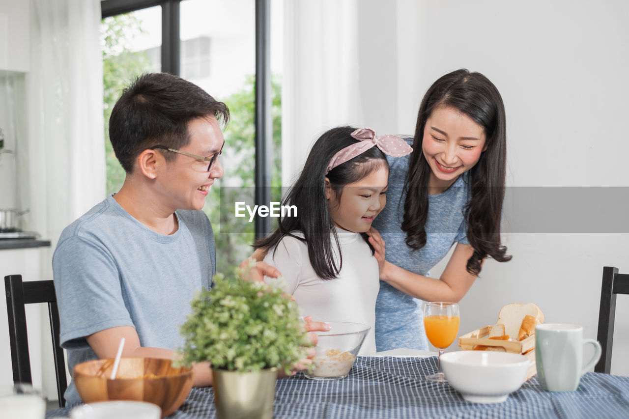 Family having breakfast at home