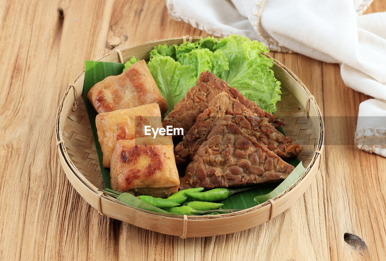 food, food and drink, meat, dish, vegetable, healthy eating, freshness, indoors, cuisine, no people, wood, meal, wellbeing, table, high angle view, studio shot, asian food, produce, still life