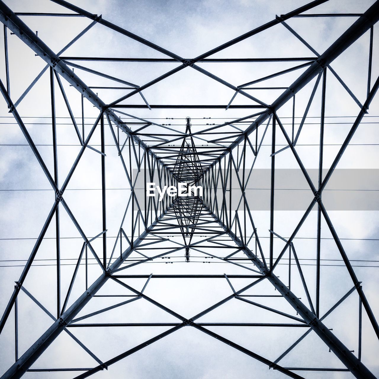 LOW ANGLE VIEW OF ELECTRICITY PYLONS