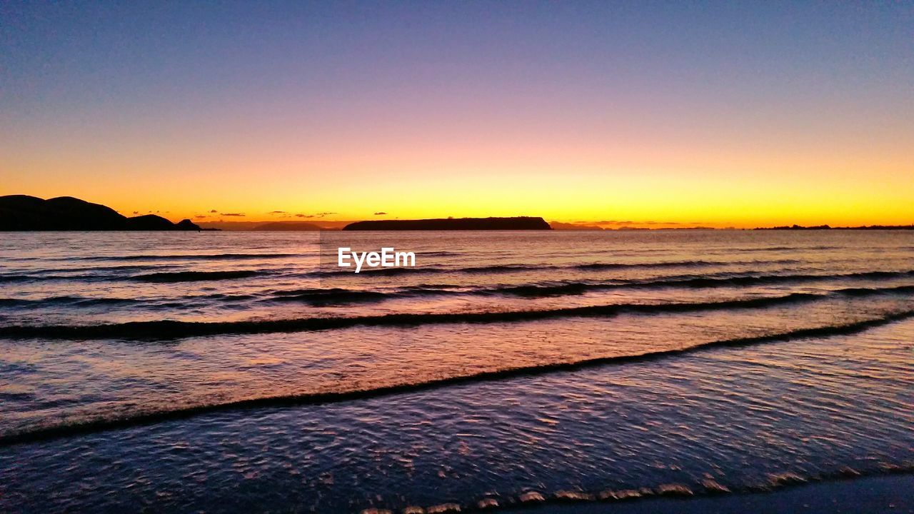 View of calm sea against clear sky