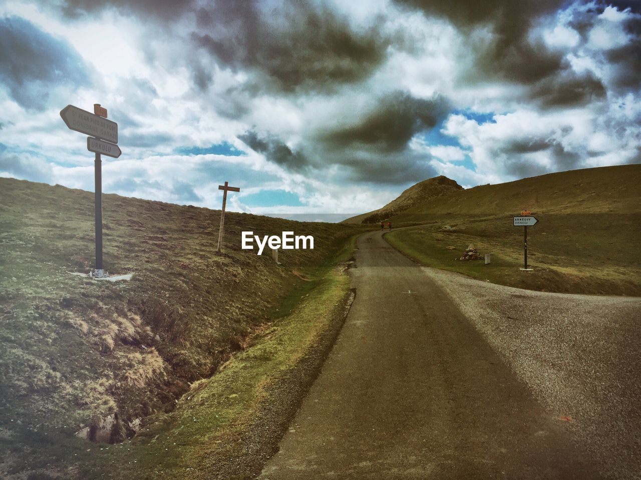 Dirt road passing through landscape