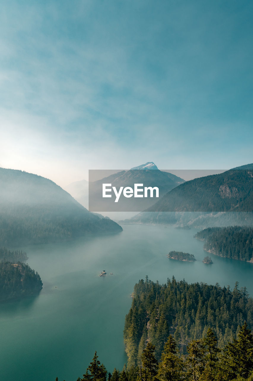 Smoke from nearby wild fires settle at diablo lake in north cascades national park