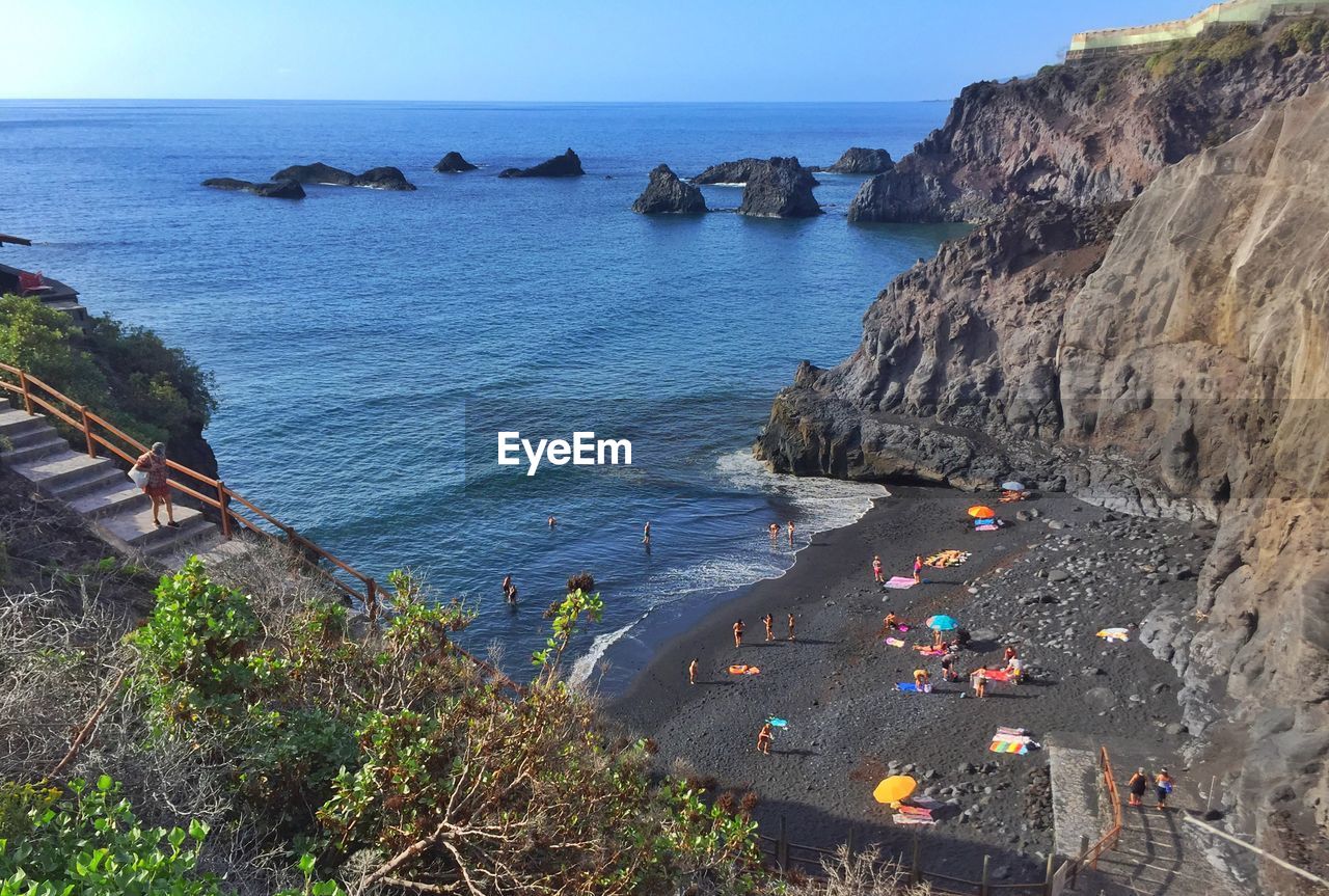 High angle view of sea shore against sky