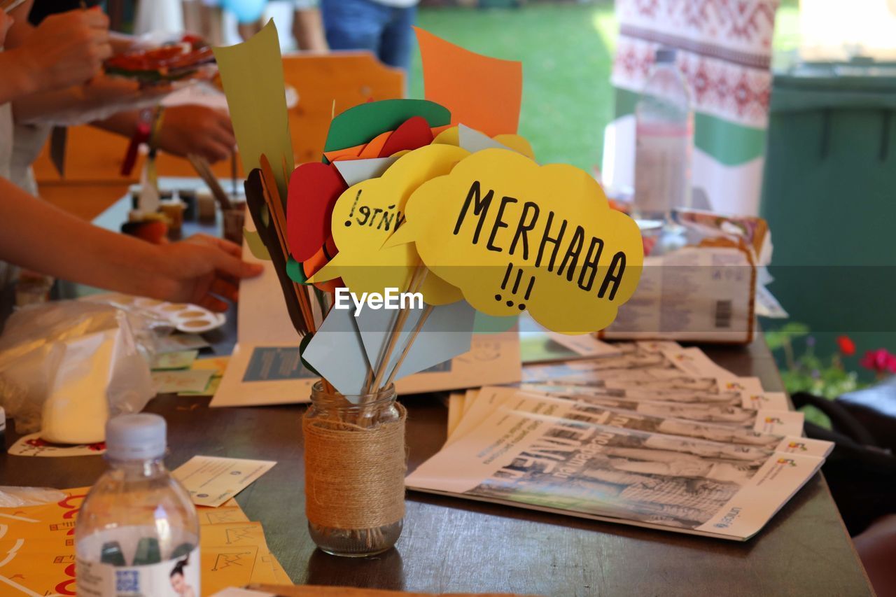 Close-up of propped speech bubbles on table