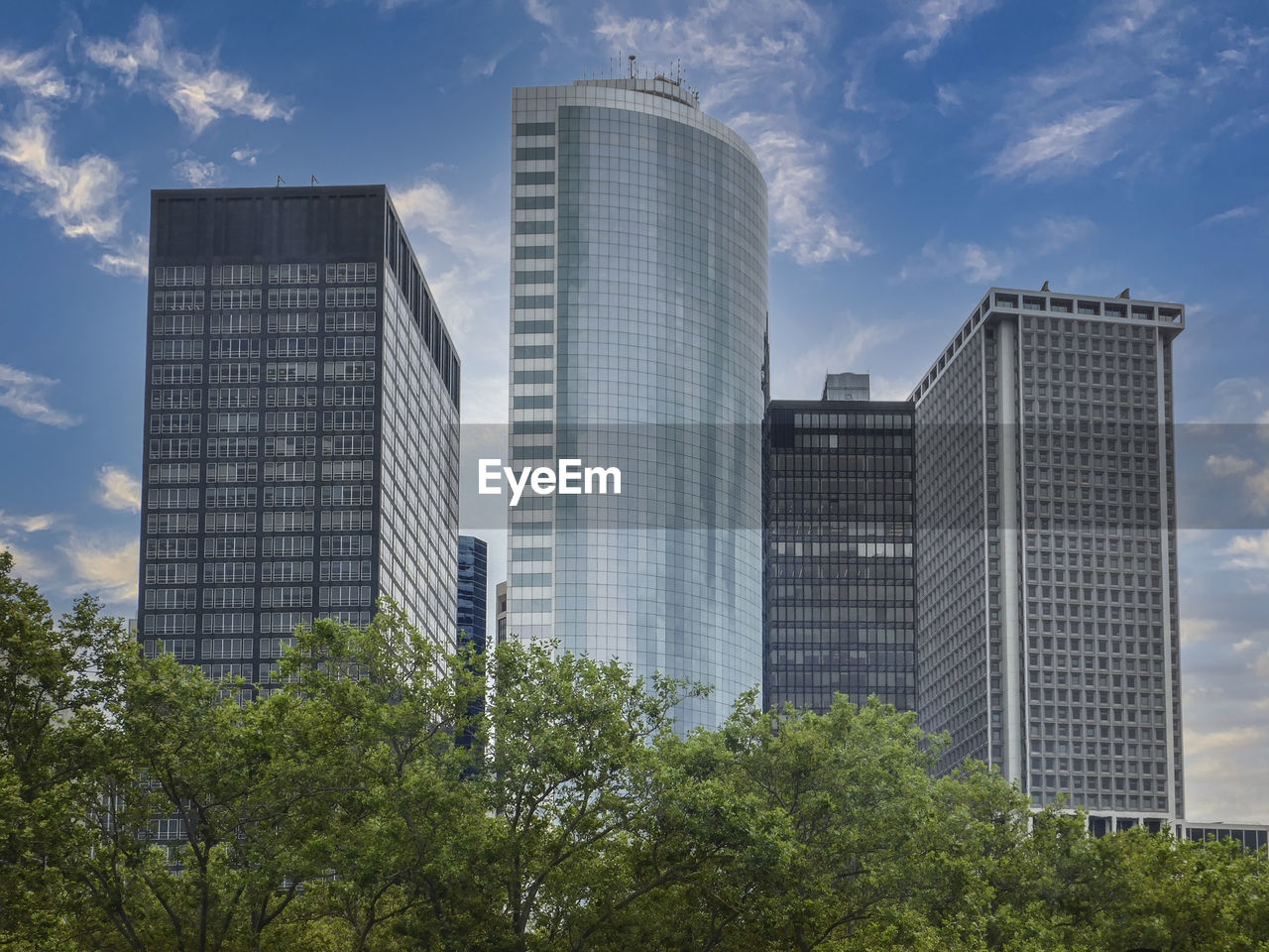 Low angle view of modern buildings against sky