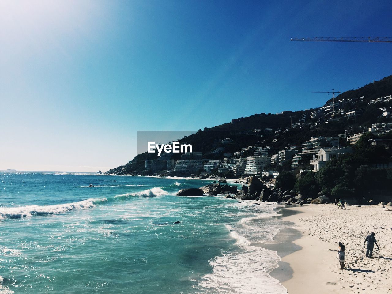 Scenic view of sea against sky on sunny day