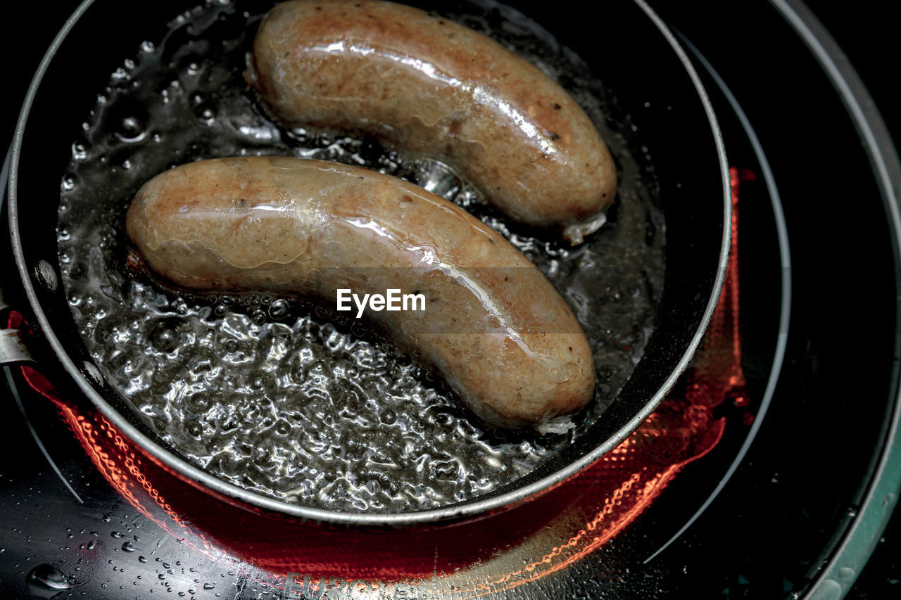 High angle view of meat in cooking pan