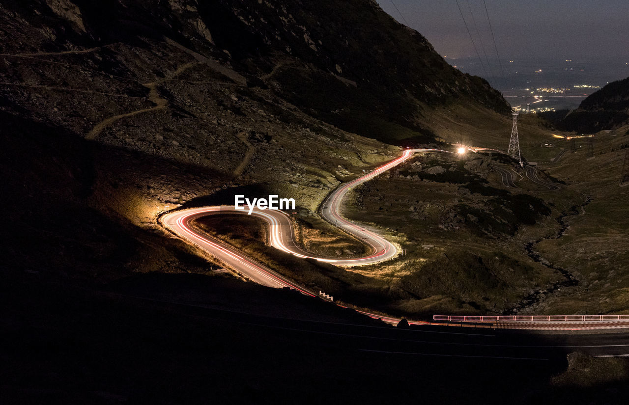 High angle view of light trails on road