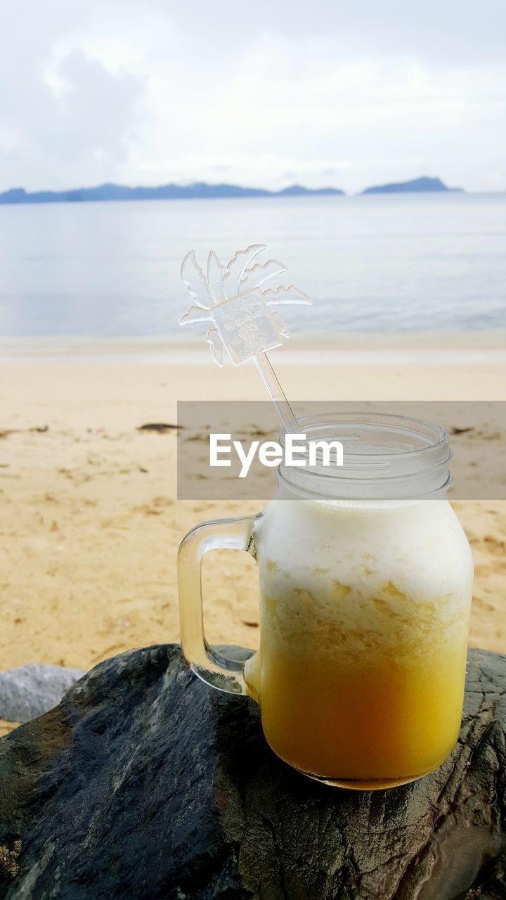 Cocktail on rock at beach