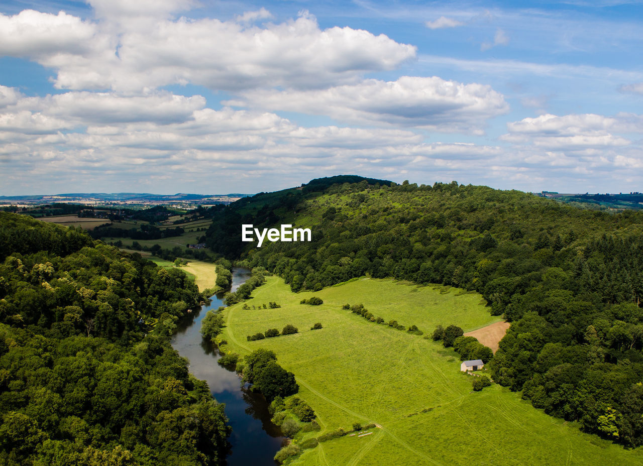 High angle view of trees on field against sky