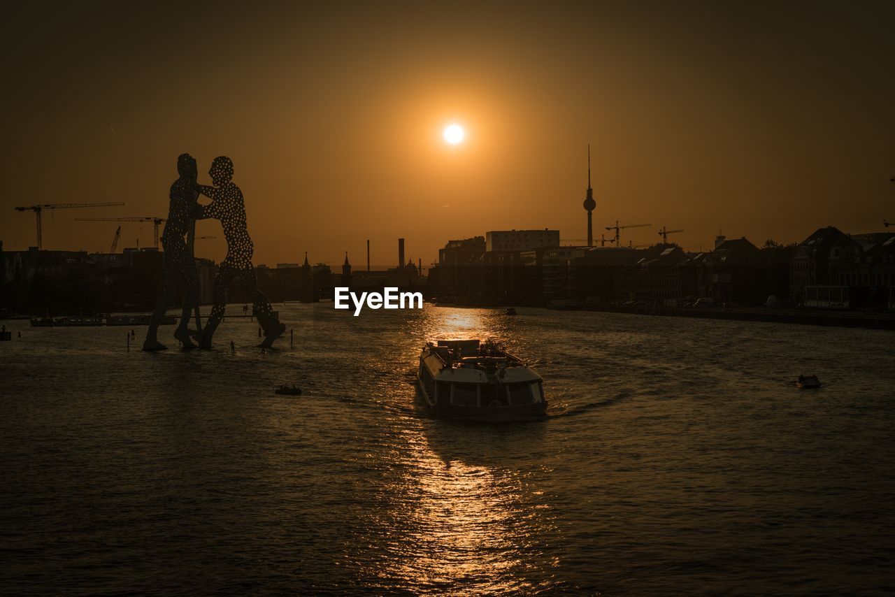 SCENIC VIEW OF SEA AGAINST ORANGE SKY