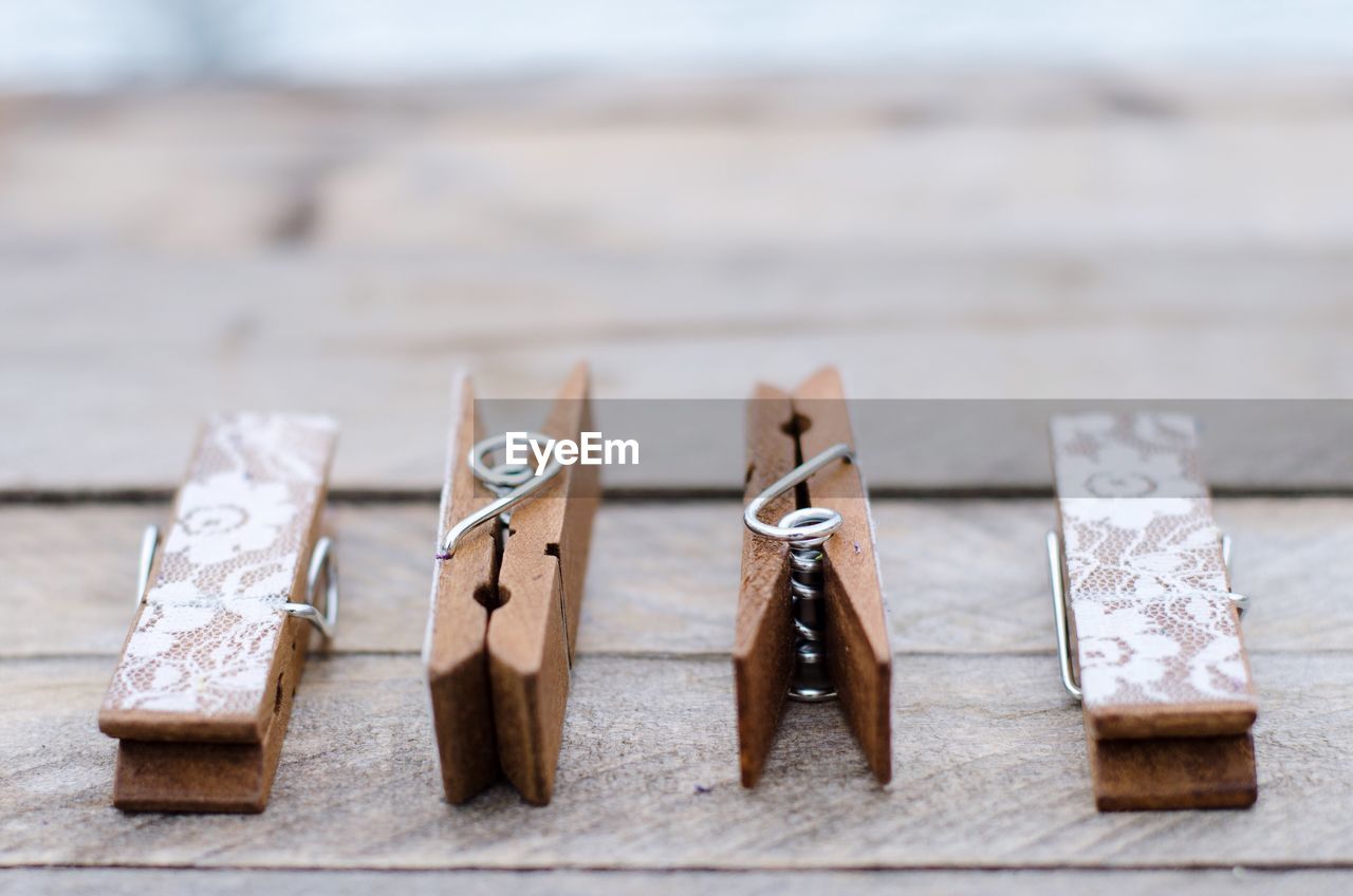 Close-up of four clothes pins