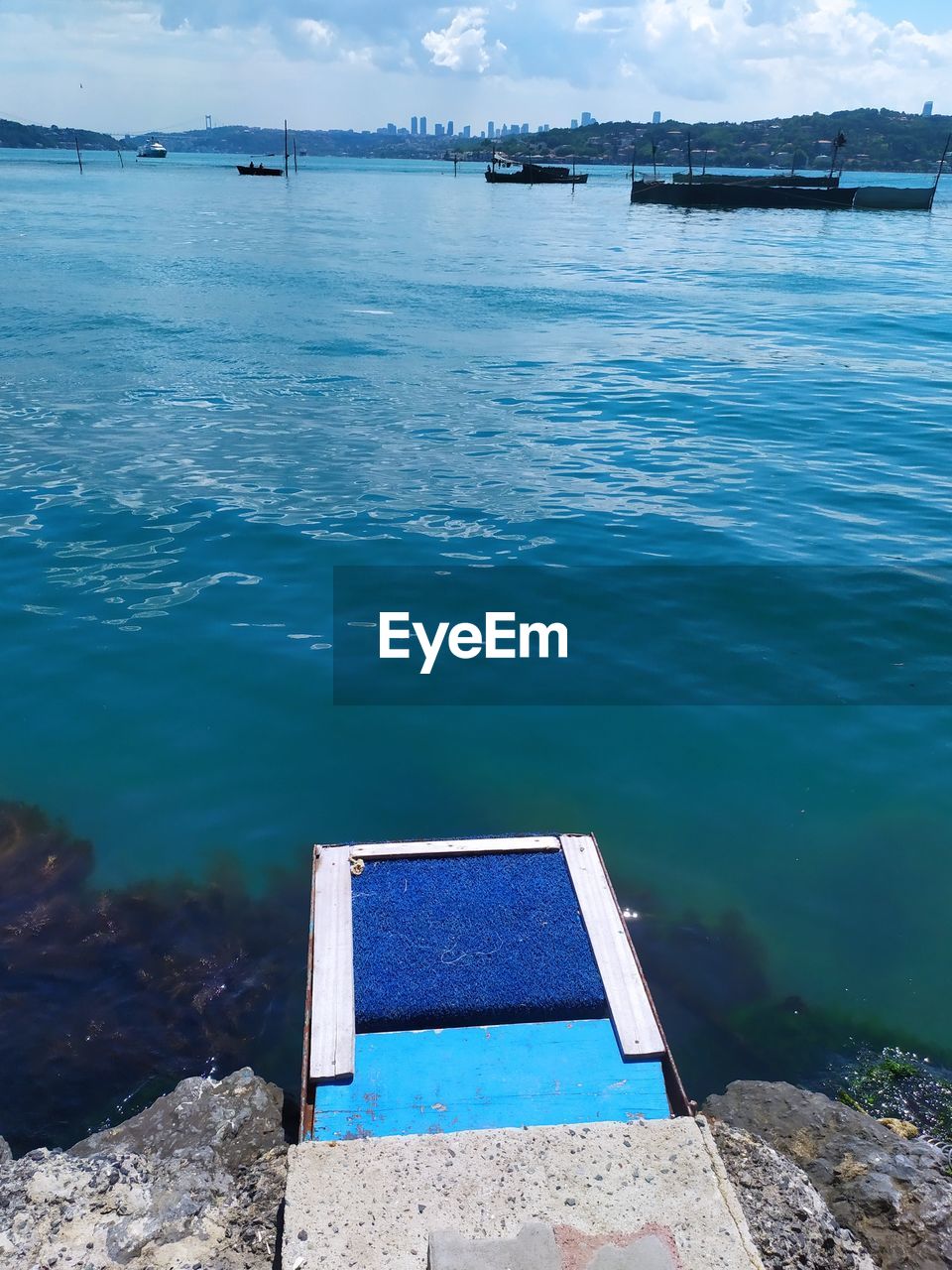 HIGH ANGLE VIEW OF SWIMMING POOL BY SEA