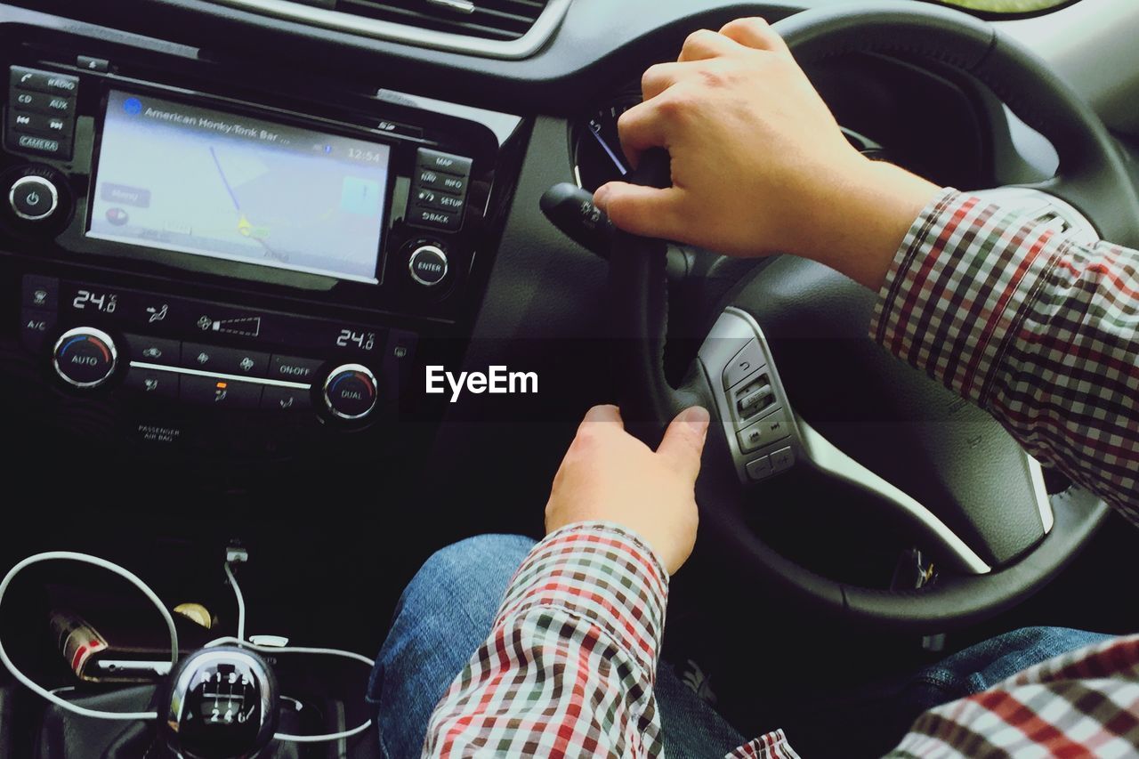 CLOSE-UP OF WOMAN IN CAR