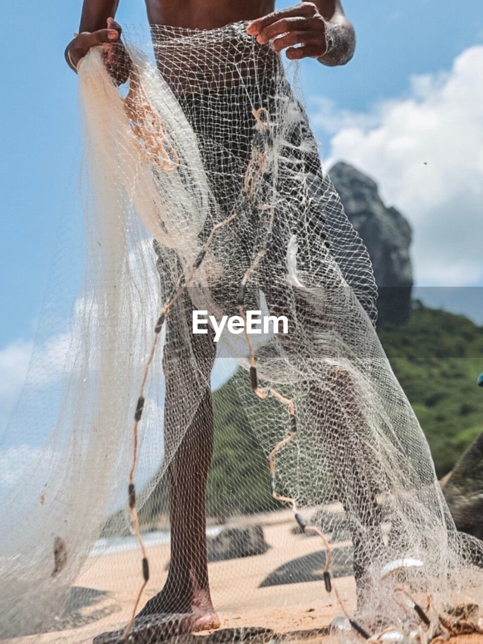 nature, sky, adult, fishing net, spring, one person, dress, wedding dress, cloud, women, day, standing, clothing, land, netting, commercial fishing net, bride, sunlight, outdoors, fishing industry, water, fishing, activity, beach, person, holding, fashion