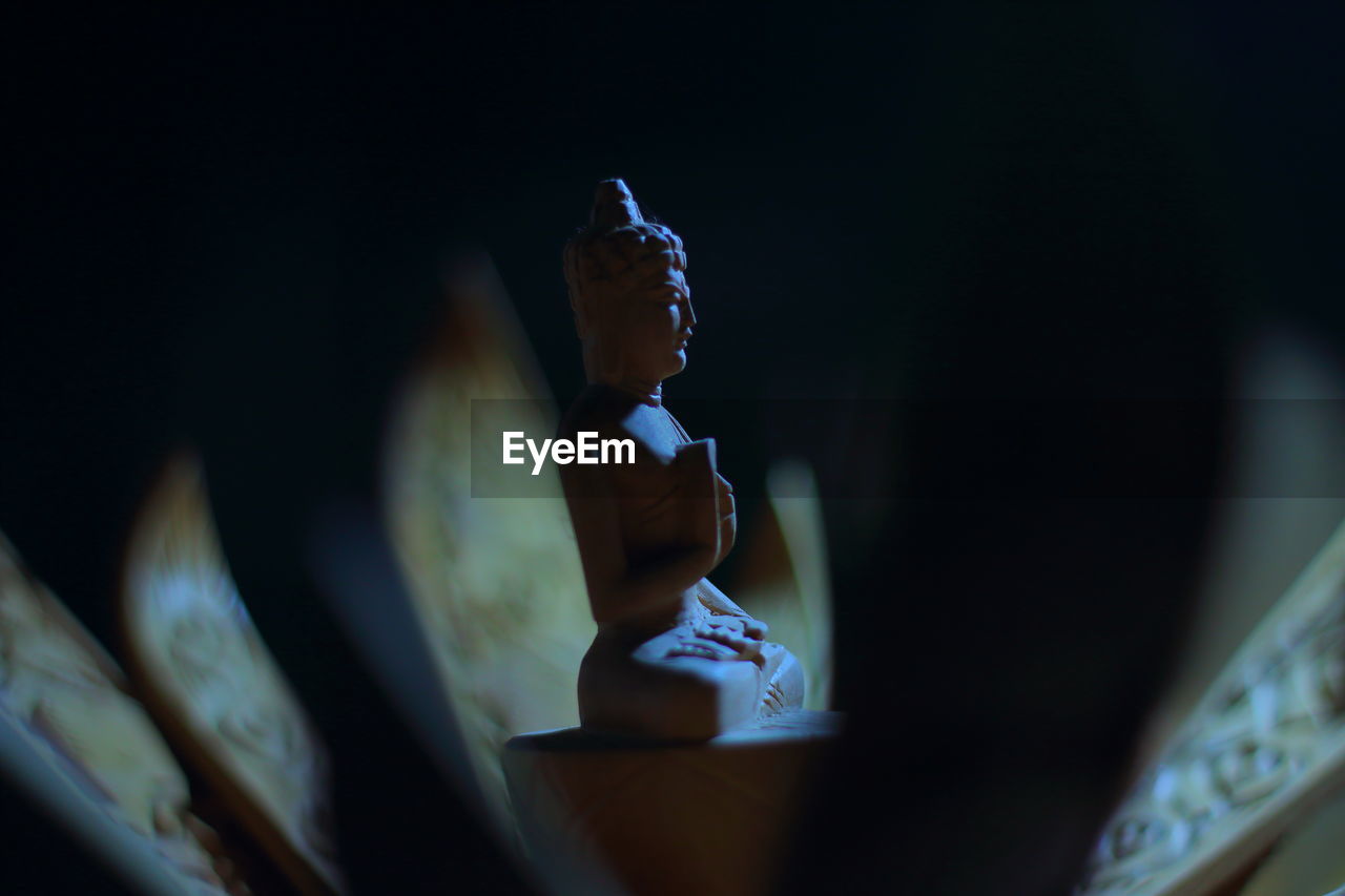Close-up of buddha figurine