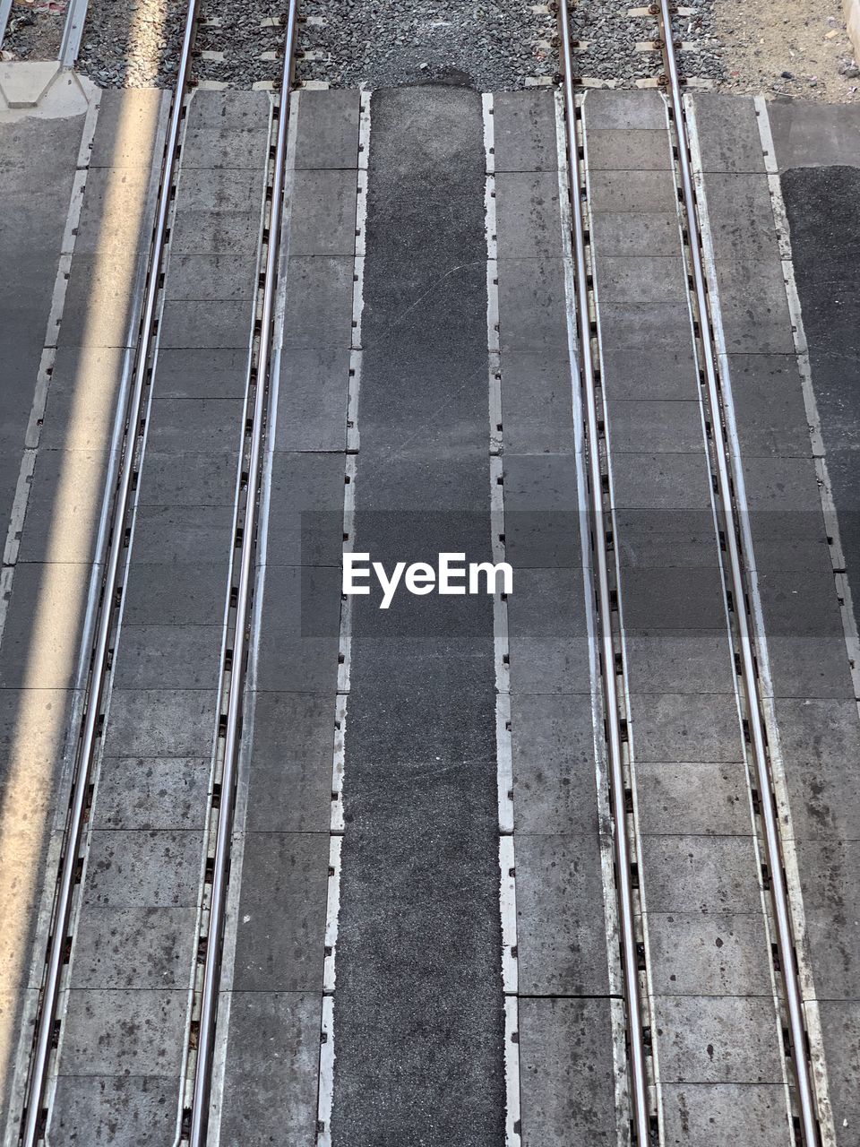 HIGH ANGLE VIEW OF RAILROAD TRACK