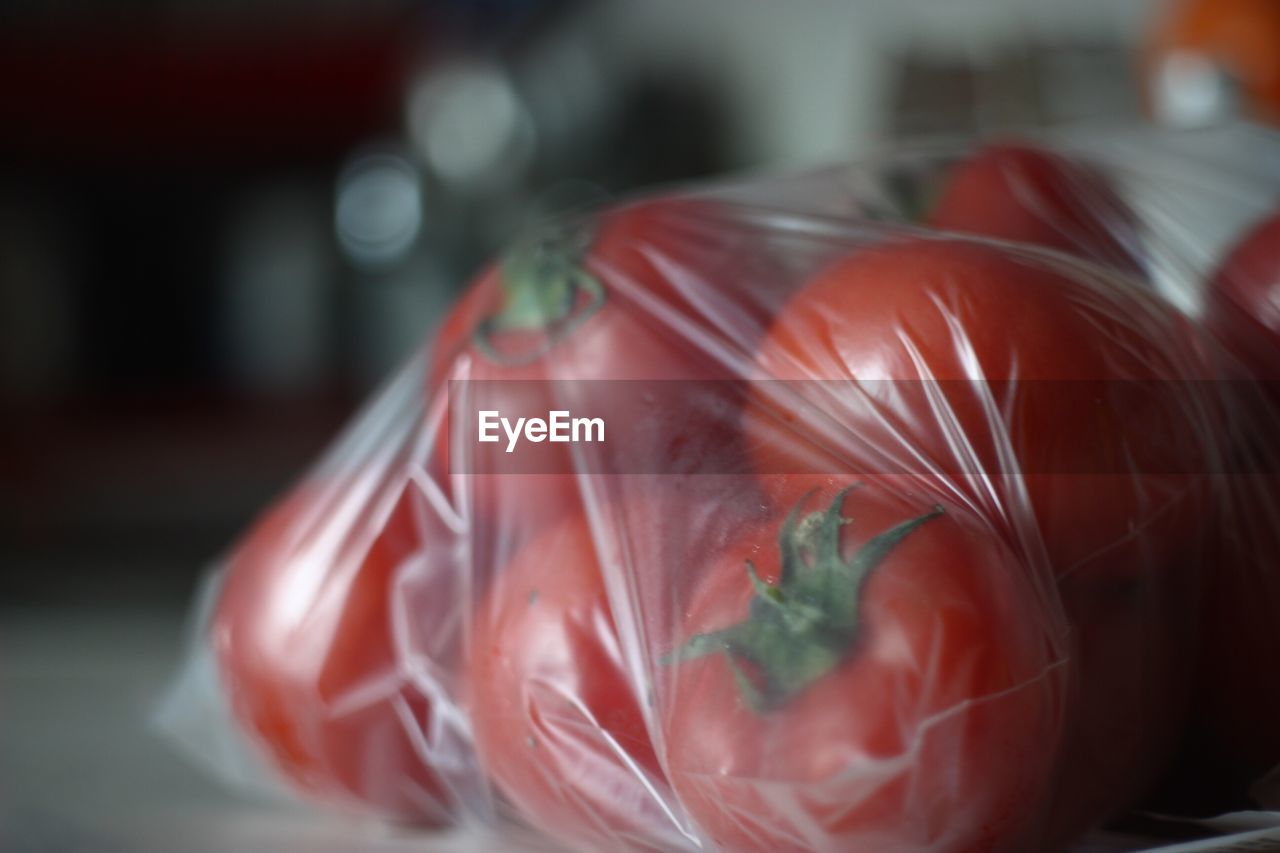 Close-up of tomatoes in plastic bag