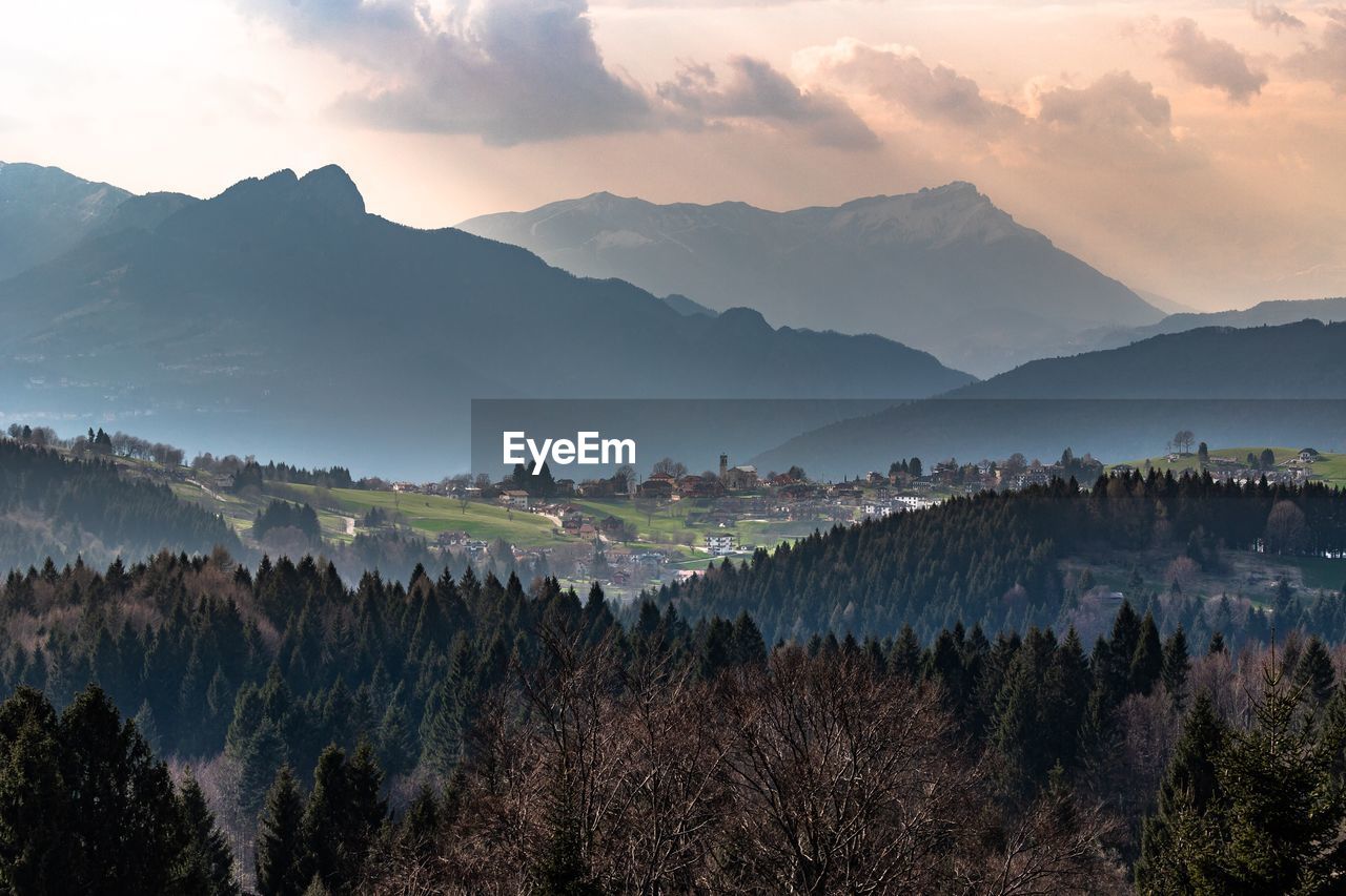 Panoramic view of mountains against sky during sunset