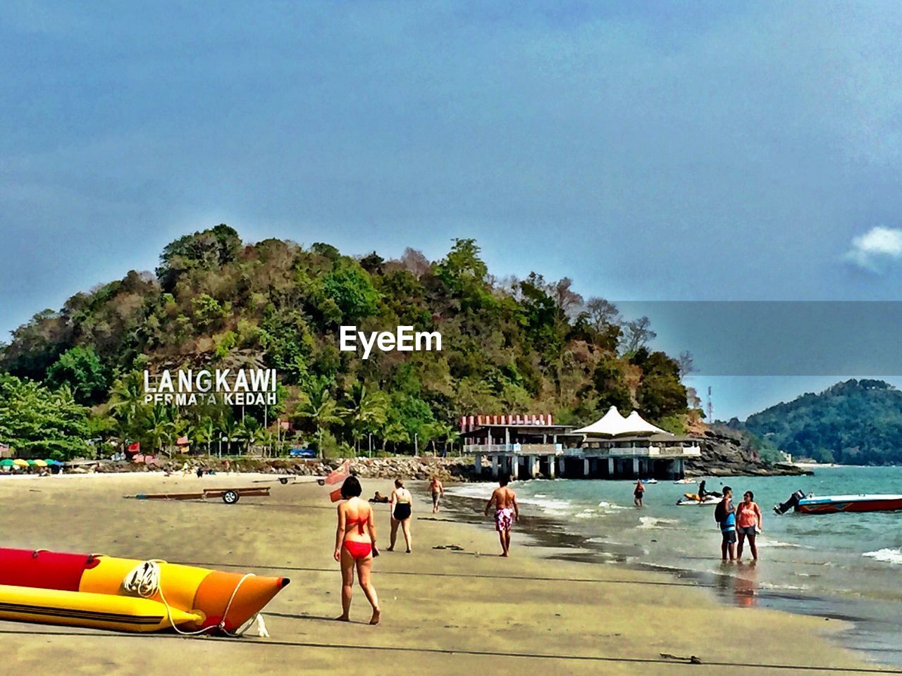 TOURISTS ENJOYING AT BEACH