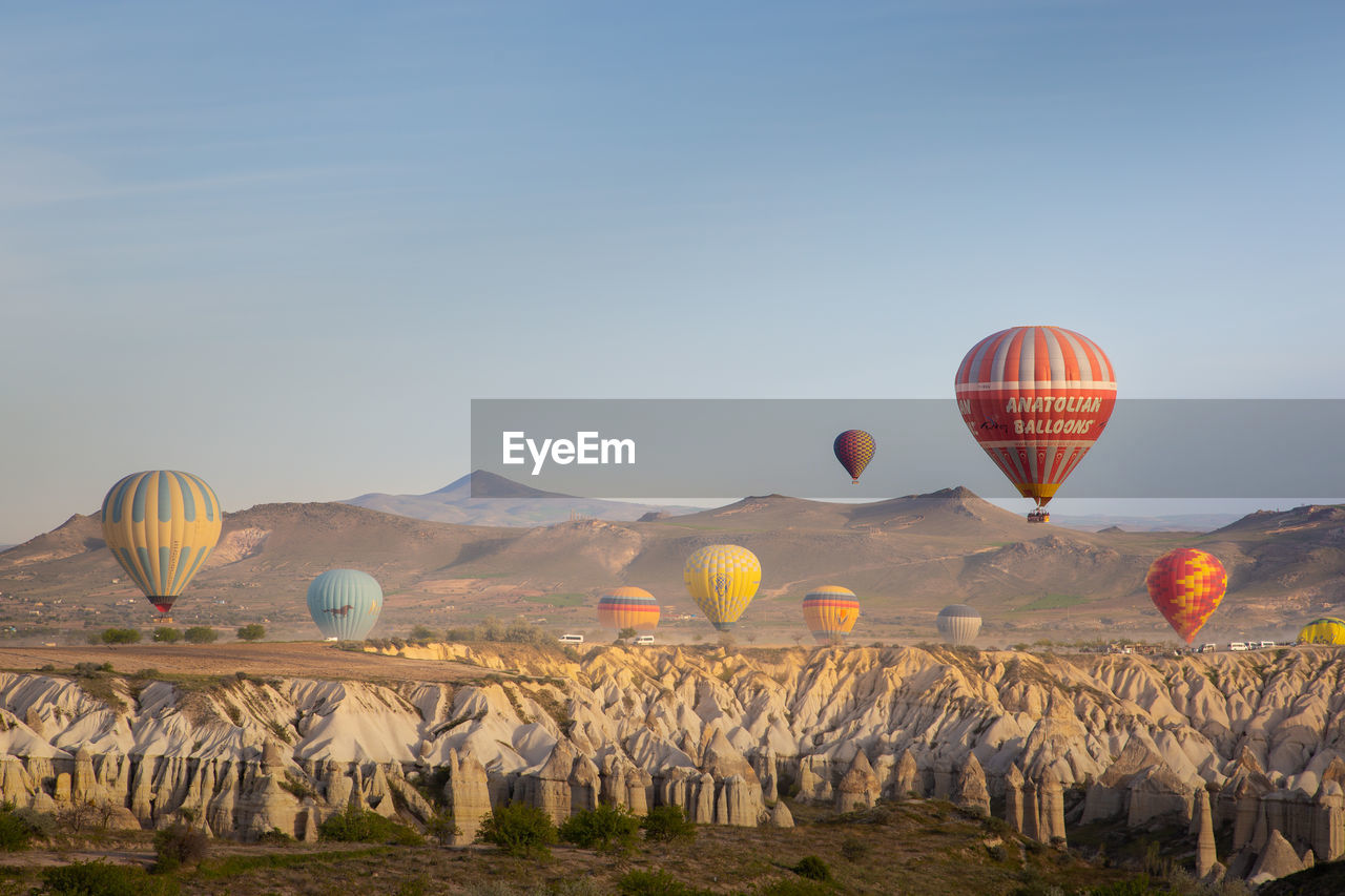 VIEW OF HOT AIR BALLOON FLYING IN SKY