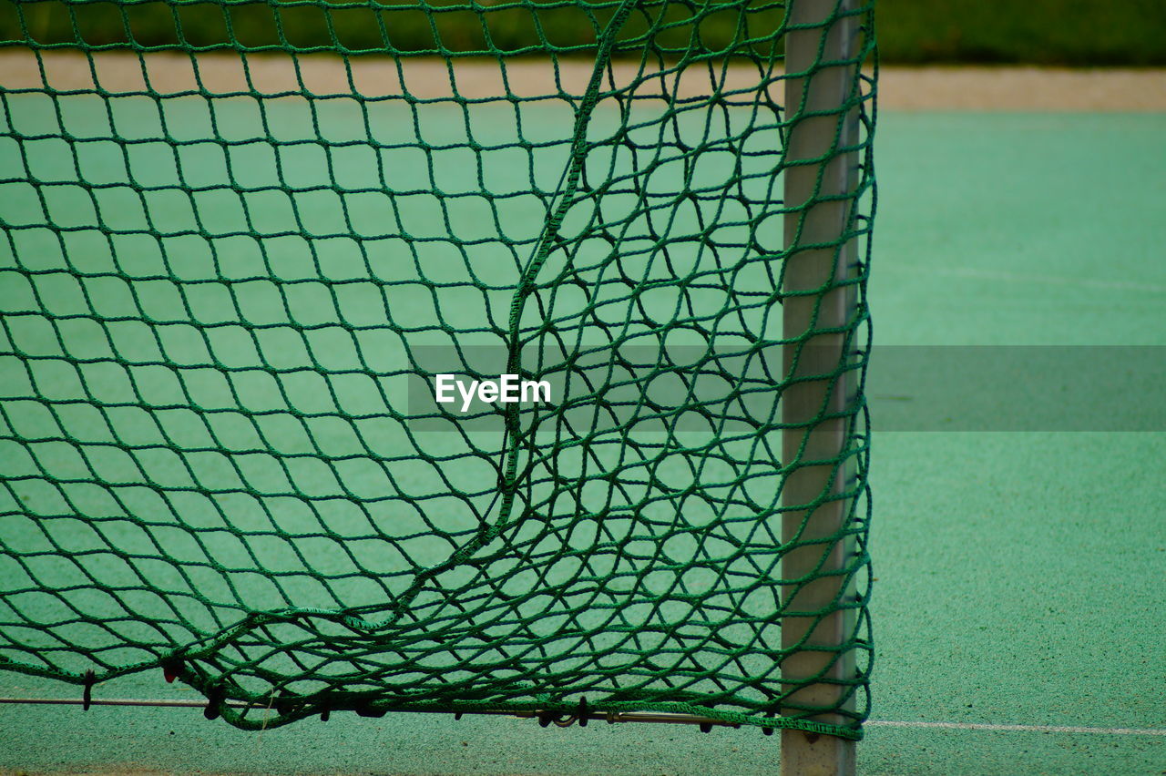 CLOSE-UP OF SWIMMING POOL WITH BALL