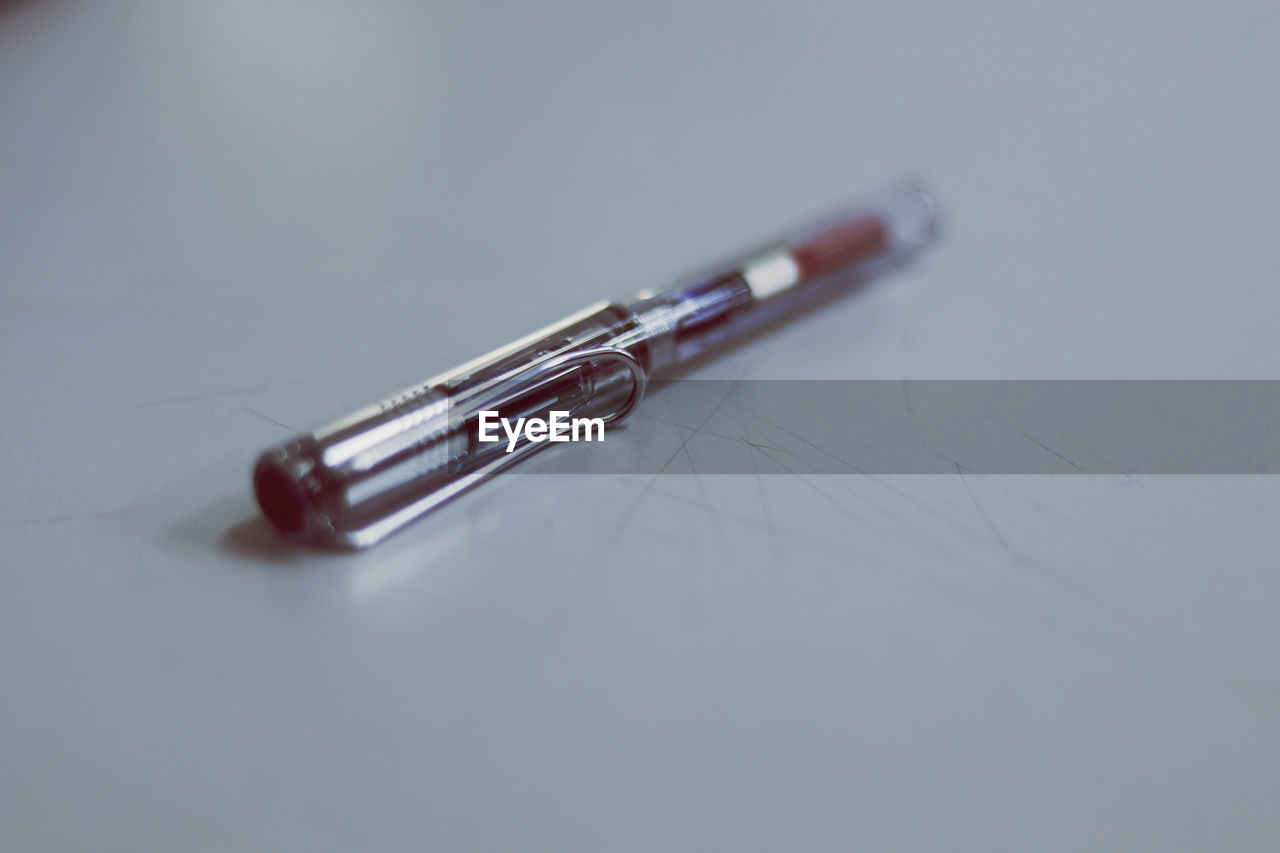 High angle view of pen on table