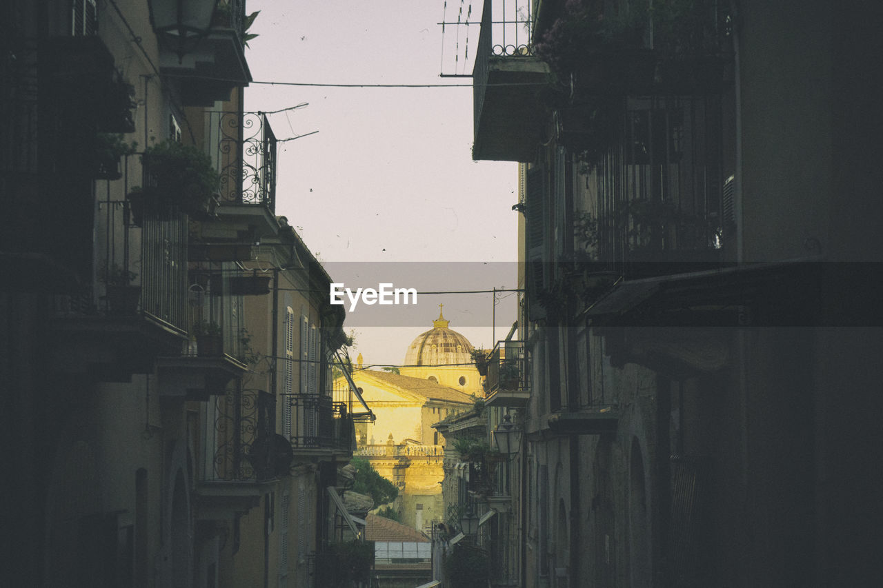 Buildings in city against sky