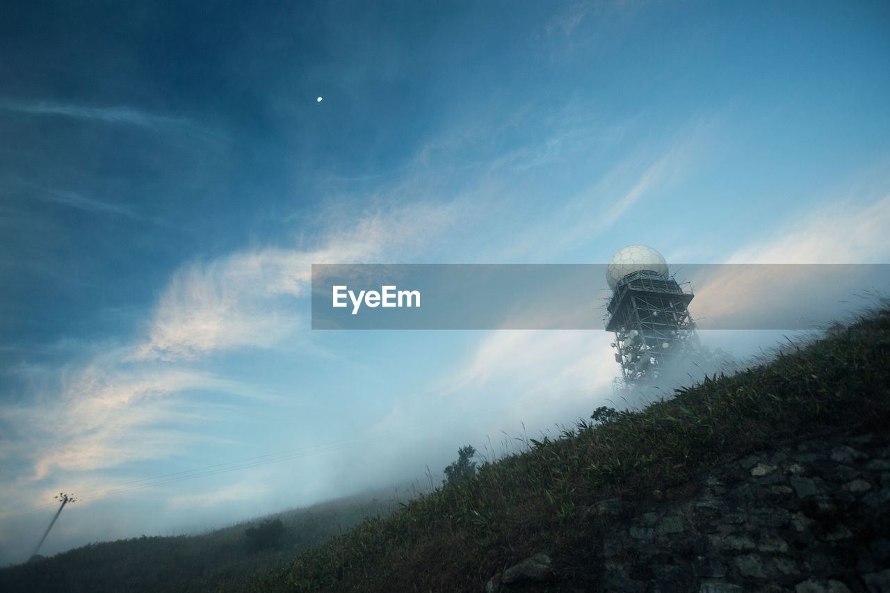 Low angle shot of water tower on landscape