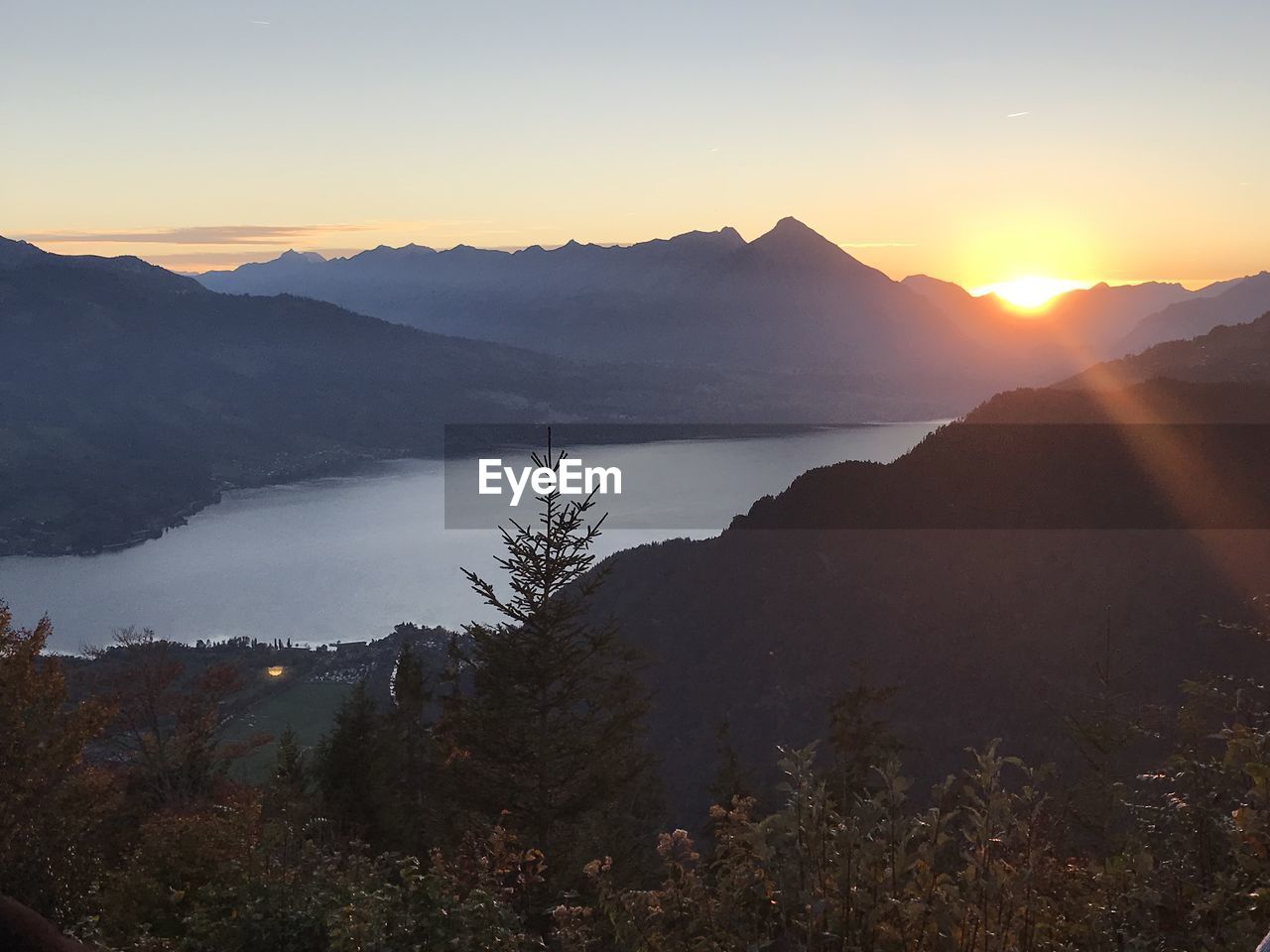 SCENIC VIEW OF MOUNTAINS DURING SUNSET
