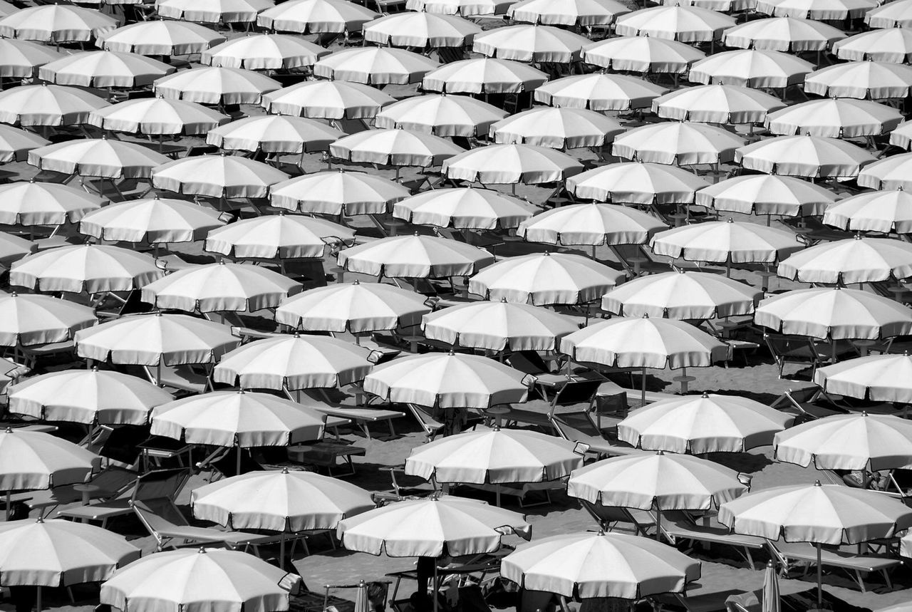 Full frame shot of parasols at beach during sunny day