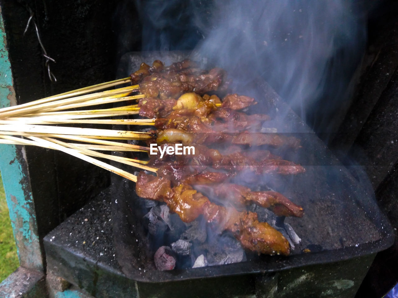 High angle view of food on barbecue grill